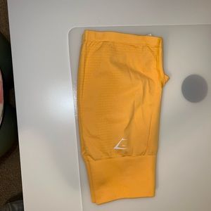 Yellow gymshark shorts medium